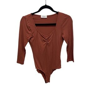 Bohme women’s rust orange bodysuit size small jersey stretch